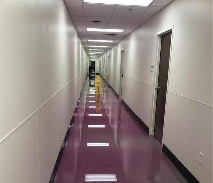Water damage can happen anytime, anywhere - like this unexpected flood in the hallway.